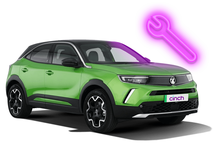 A green Vauxhall with a neon pink spanner
