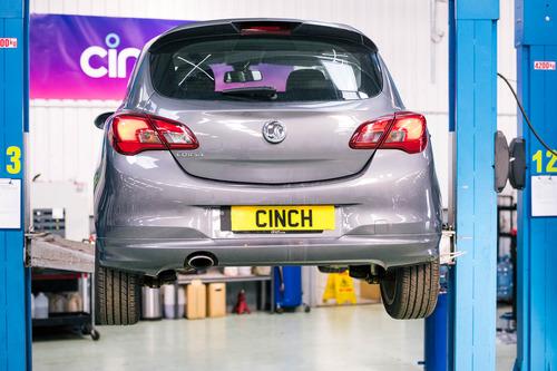cinch car winched up at a cinch service centre